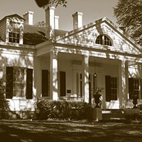 Twin Oaks house with dormer windows and four chimenys