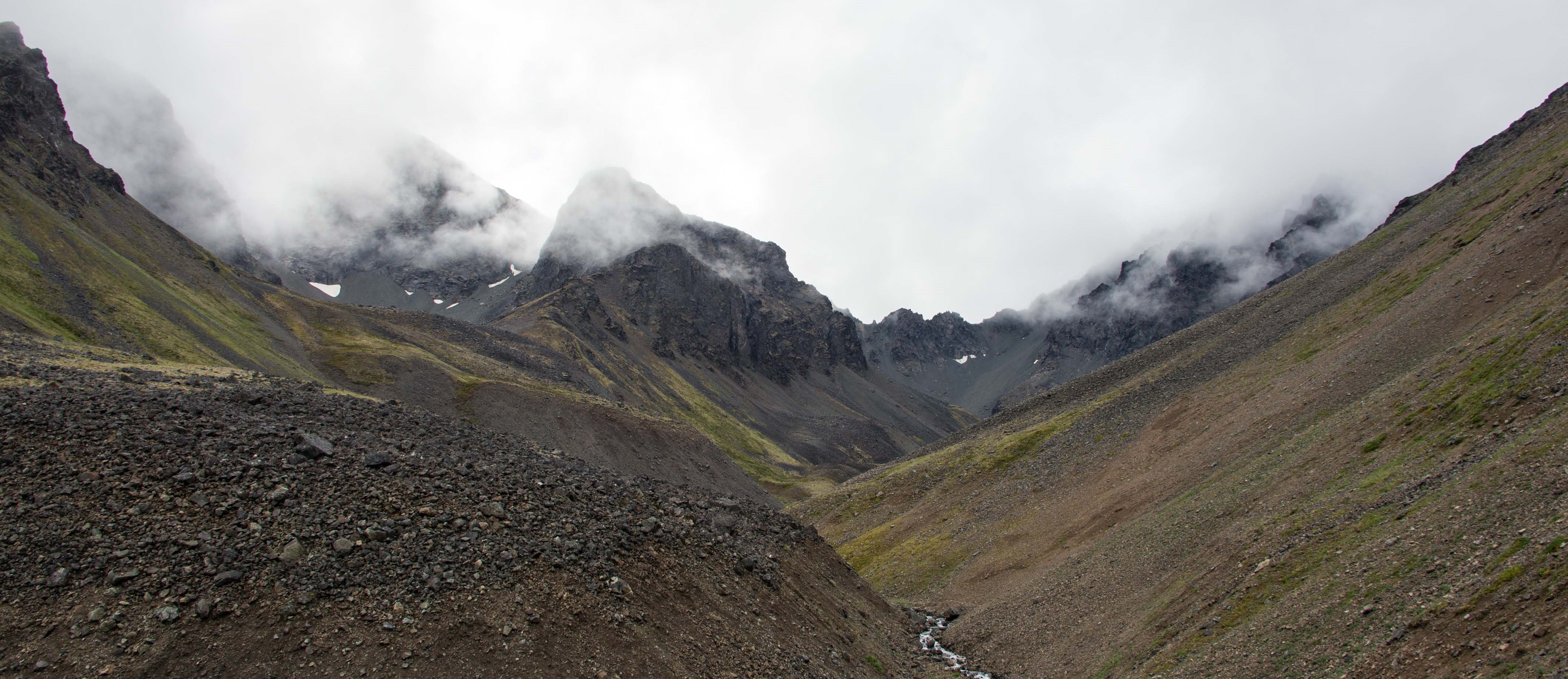 Hope Creek2 rocky peaks emerge from the clouds in a dramatic valley