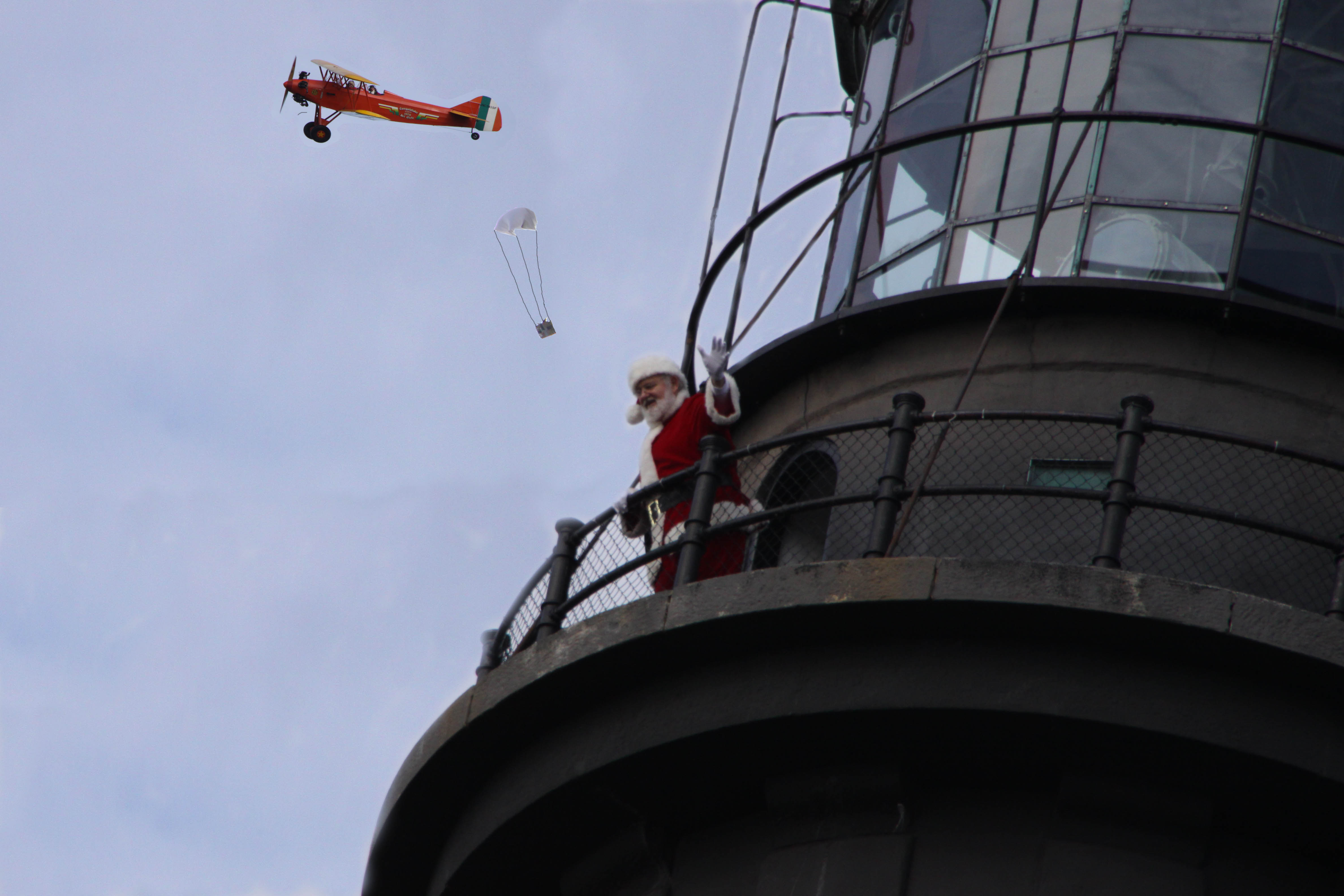 Santa stands on top of the Fire Island Lighthouse. Santa stands on top of the Fire Island Lighthouse.