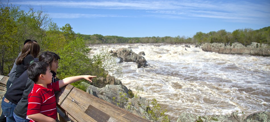 Visitors at an overlook in Great Falls Park. Visitors at an overlook in Great Falls Park.