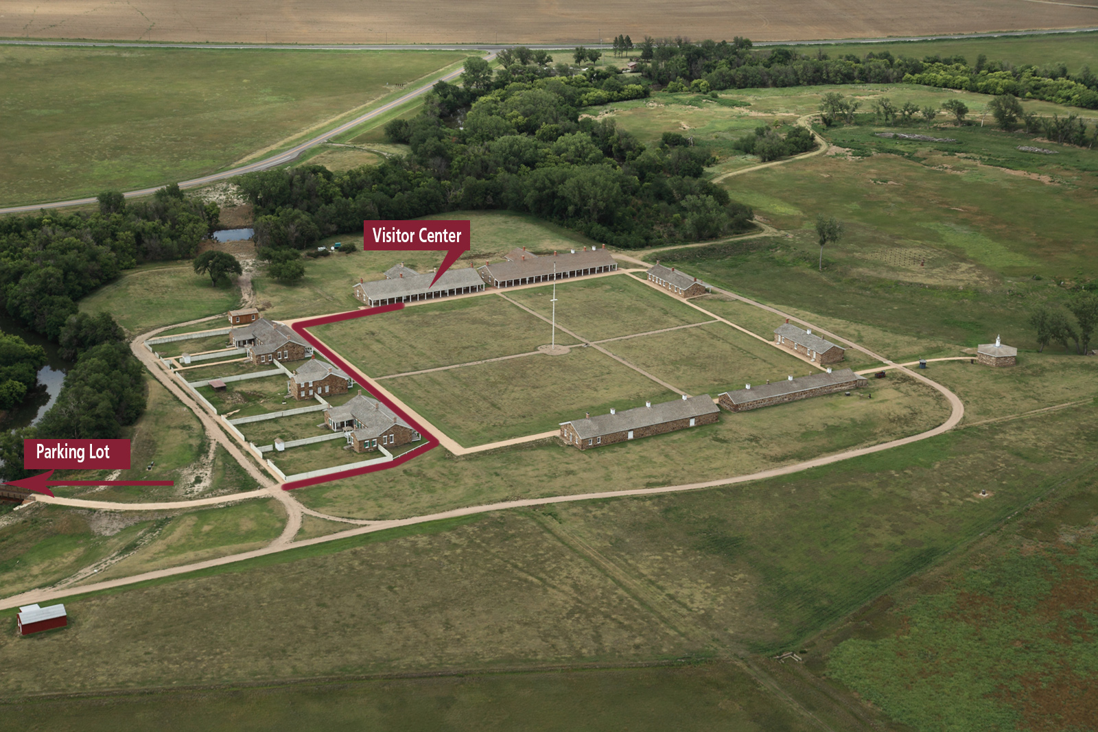 Aerial view of the sandstone buildings with route to visitor center marked.
