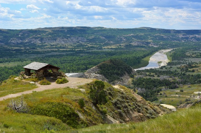 Rock walled, wooden shingled shelter overlooking the Badlands.