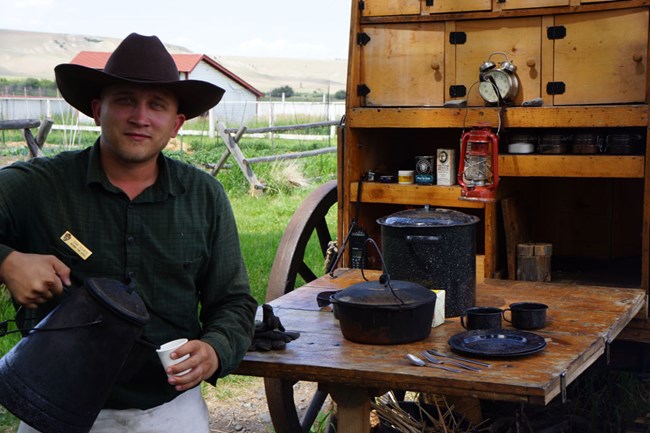 Ranger Pours Coffee Ranger in historic dress pours coffee during Chuckwagon program