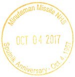 Yellow stamp with date commemorating the 1957 launch of Sputnik