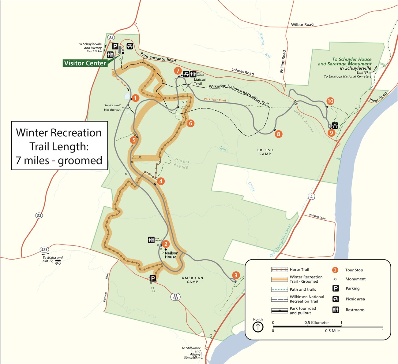 A map shows a yellow highlighted 7 mile trail in a figure 8 shape. A map key also shows symbols for other trails, roads, monuments, and landmarks.