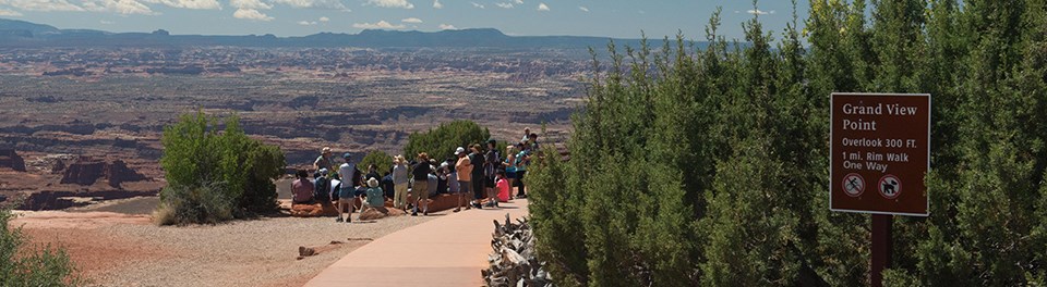 _DSC0233-top a paved sidewalk leads to a group of people standing at a viewpoint