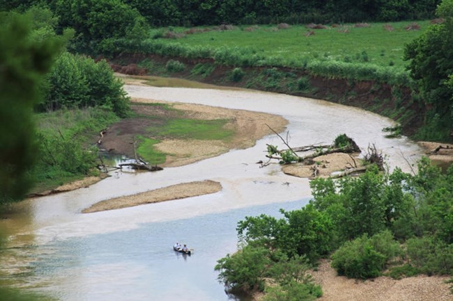 confluence_2 view from above of bend in the muddy river with islands in the middle