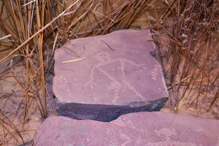 A man carved into a rock