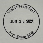 A circular ink stamp with the text, "Trail of Tears NHT, Jun 25 2024, Fort Smith NHS."