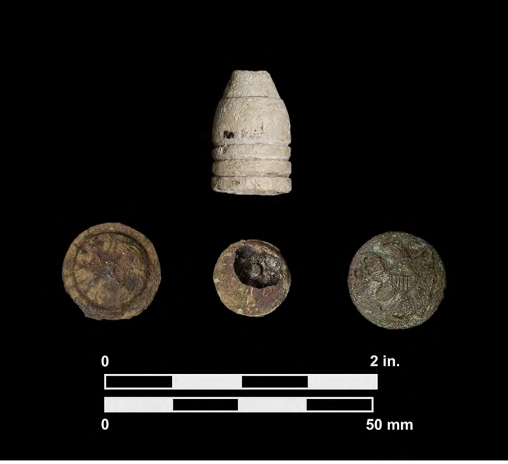 Four civil war artifacts on a black background with a 2-in. scale at the bottom of the image.