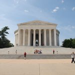 blue sky behind the white thomas jefferson memorial