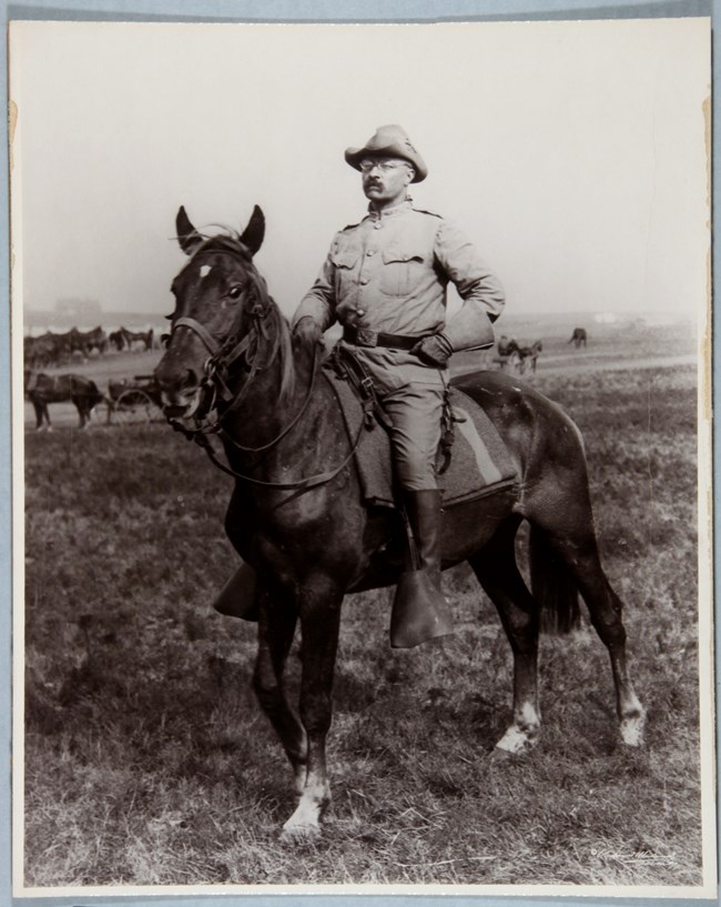 Photograph of TR in his uniform on horseback