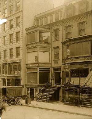 Tall office building is constructed next to 26 and 28 East 20th Street.