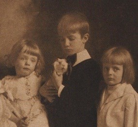 Kermit with a guinea pig from a family portrait.