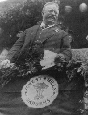 T.R. gives a speech at the Forest Hills Railroad Station.