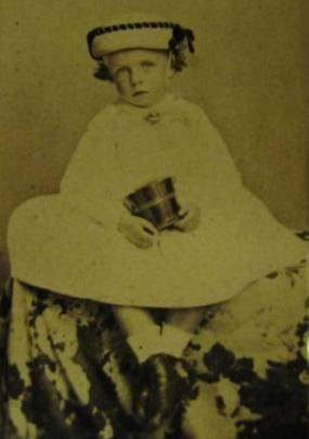Young Theodore in his christening gown. Young Theodore in his christening gown.