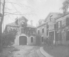 The historic carriage house c. 1921.