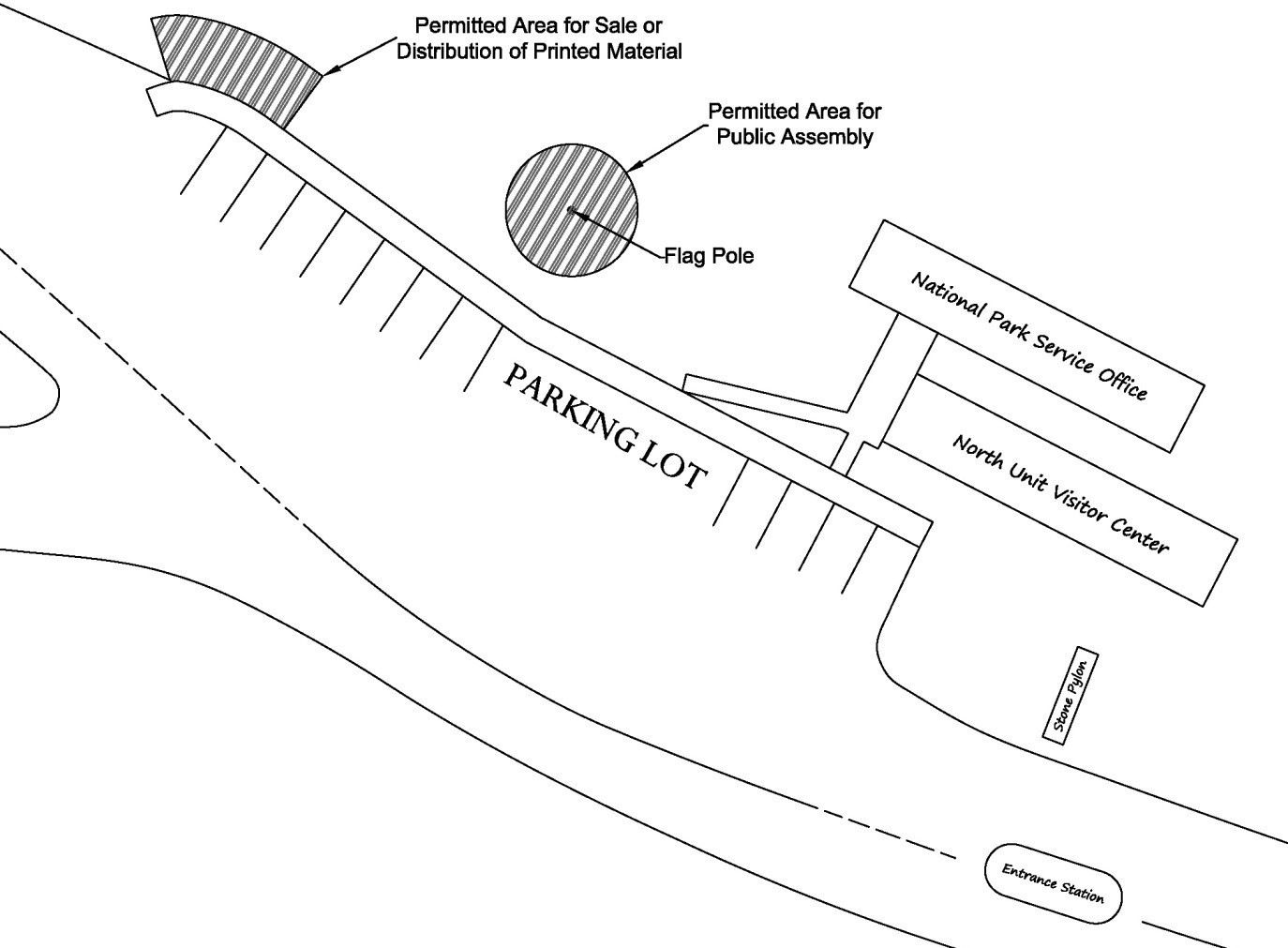 A map showing the North Unit Visitor Center area and designated location for printed materials and permitted area for public assembly. Both areas are to the top left of the visitor center on the right side of the parking lot.