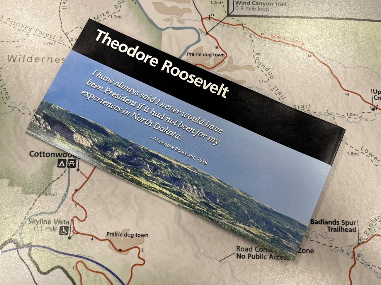 Theodore Roosevelt National Park brochure on top of a park map