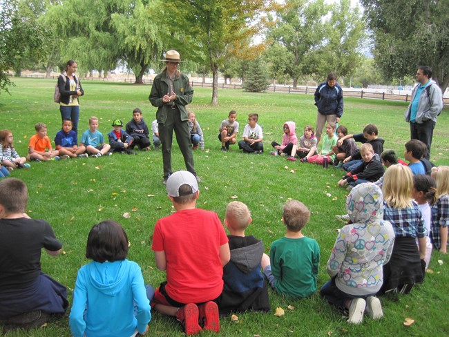 Ranger talking to students