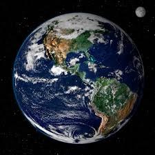 Planet Earth as seen from space with moon in far background