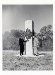 Photograph of Superintendent C. Ray Vinten and Congressman Charles E. Bennett standing in front of the Ribault Monument at its second Mayport location, 1954.