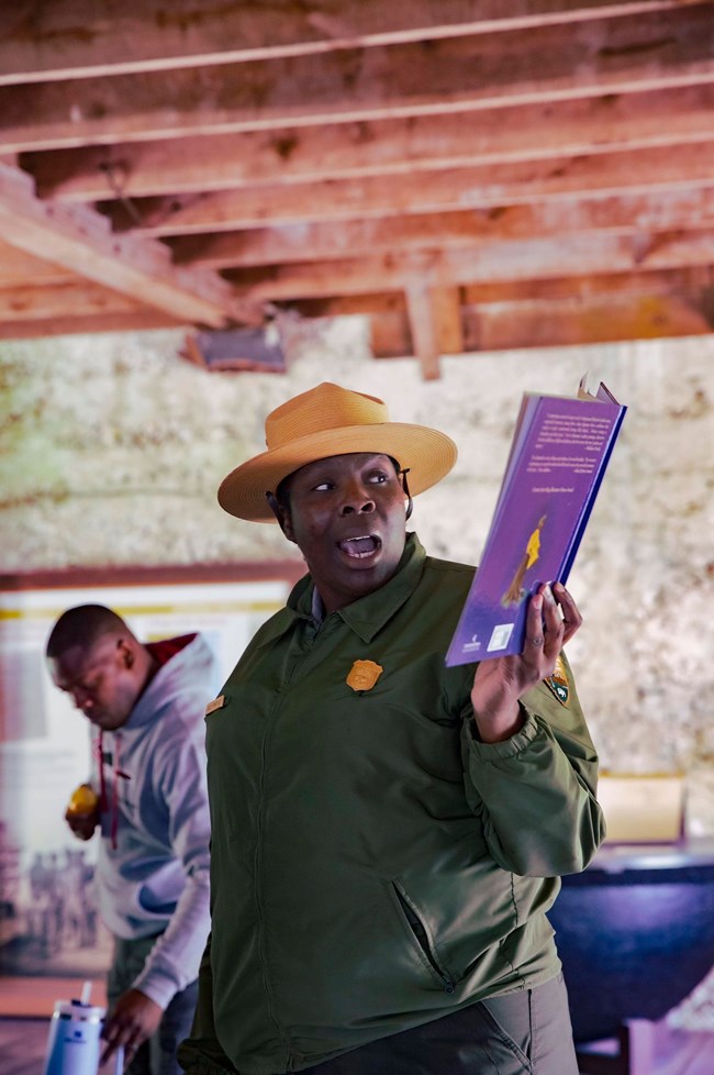 ranger reading a childrens book