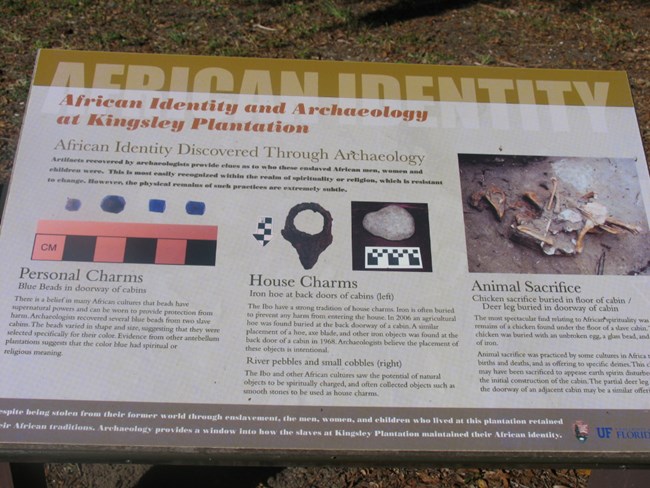 an exhibit panel with images of artifacts and text Title reads African Identity