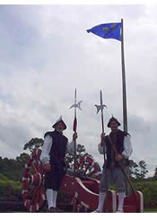 French soldier reenactors next to cannon at Fort Caroline