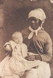 Historic photograph of an unnamed slave woman holding a white child Historic photograph of an unnamed slave woman holding a white child