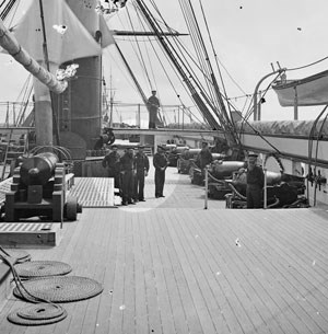 Historic photo of Union sailors and crew members, quarterdeck, and starboard battery of the U.S.S. Pawnee
