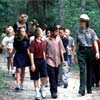 Elementary school students on a walk with a park ranger at Fort Caroline