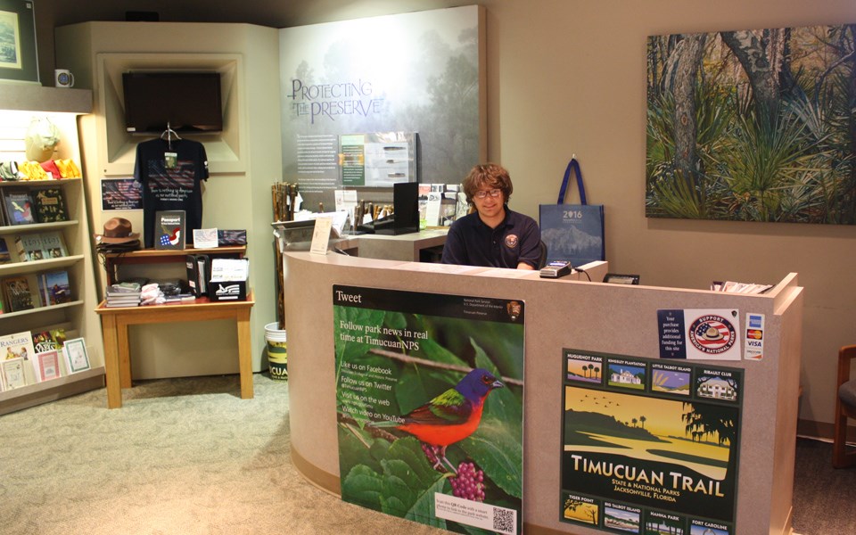 volunteer working at front desk