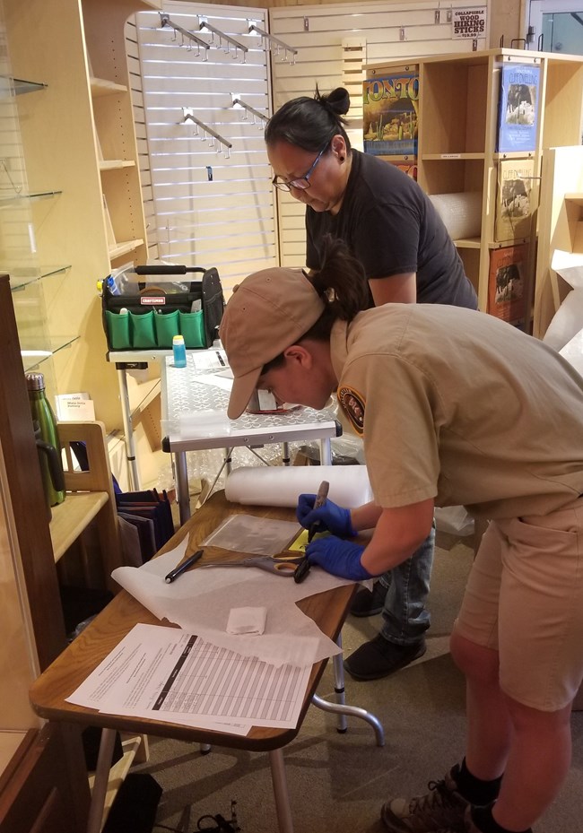 Staff packing museum artifacts