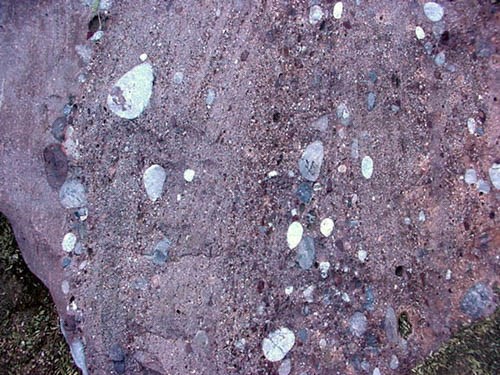 Many small rocks naturally cemented together to create a conglomerate.