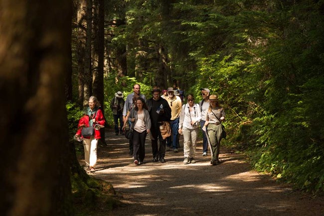 Totem Walking Tour Park Ranger giving a tour on the Totem Trail to visitors