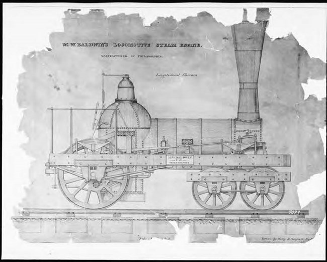 Historic image of a steam locomotive engine.