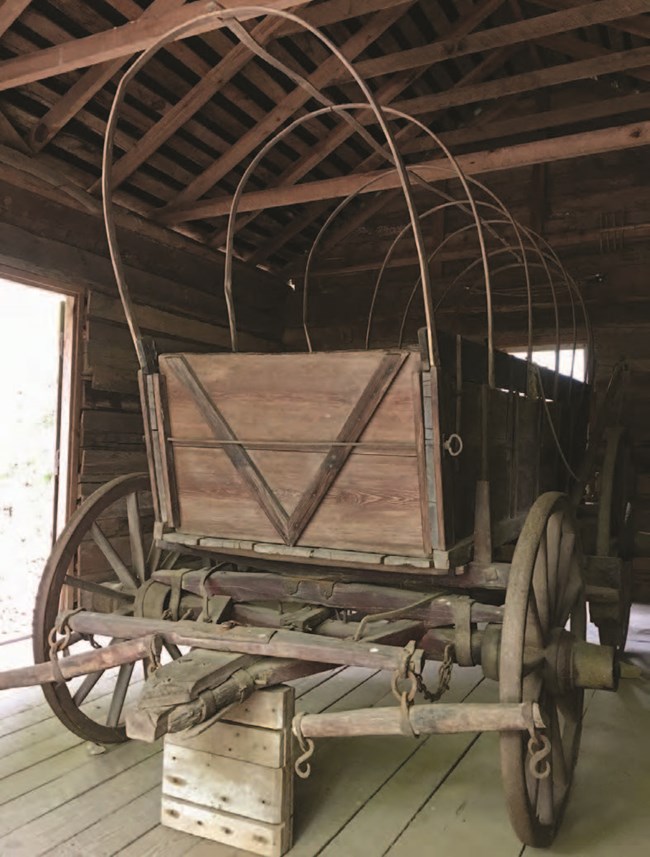 lt= Historic covered wagon without the cover.
