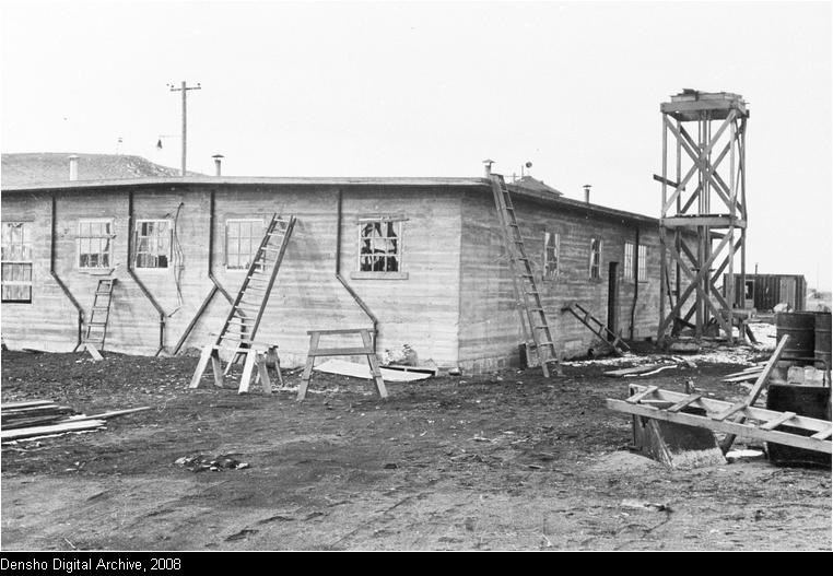 Concrete jail being built with building materials scattered on the ground. Concrete jail being built with building materials scattered on the ground.