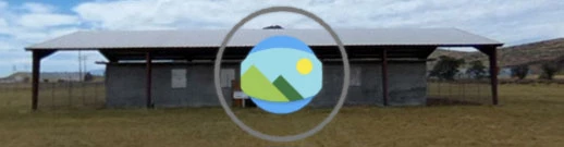 PreConstruction VR Logo Image of the Jail prior to the restoration with a headset logo.