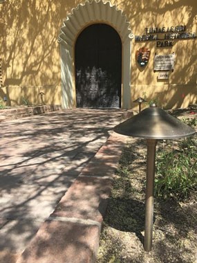 shield light fixture on path lights in front of visitor center