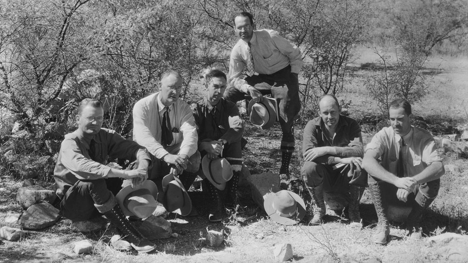 historic photo of group of six men in field gear of the 1930s