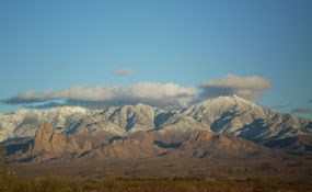 snowy mountains in the distance