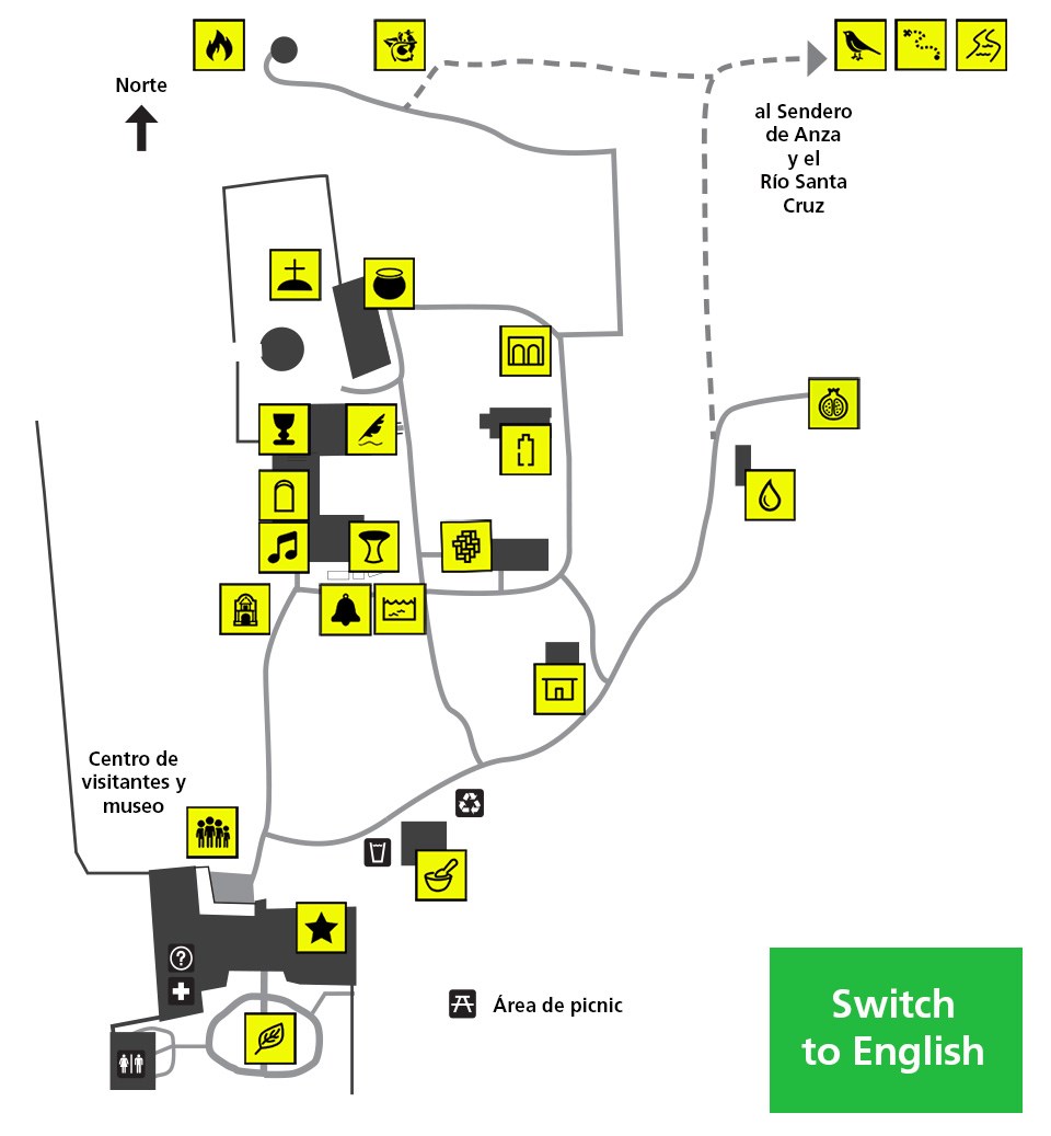 map of mission grounds with tiny yellow symbols and green box reading "Switch to English"