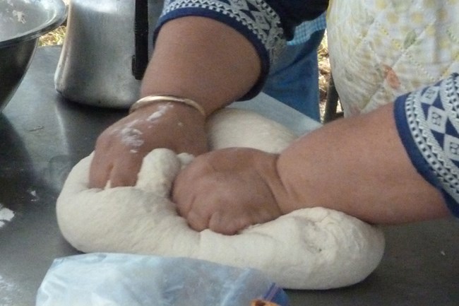 Flour tortillas-kneading Hand kneading tortilla dough.