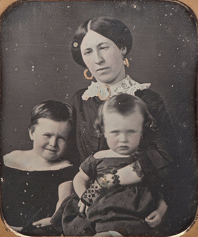 Julia Dent Grant with Frederick Grant and Ulysses Jr. circa 1854 Black and white photo of Julia Grant and two young children