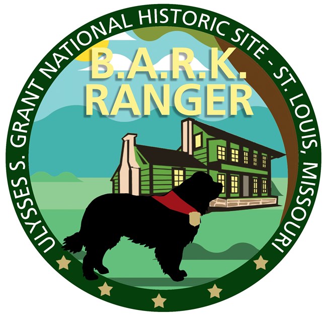 Round symbol with drawing of a black dog and green house