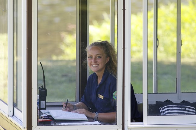 Intern inside the information kiosk.