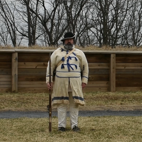 animated gif from video, a soldier picks up musket and moves it to opposite shoulder