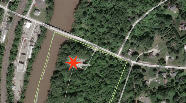 Aerial photo of Fatlands trailhead area with star in parking lot marking pick up drop off location